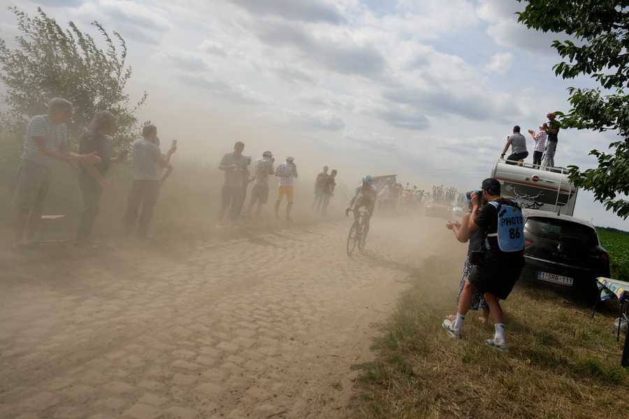 Cycling Tour de France Review Photo Gallery Riders pass over the cobblestones during the fifth stage of the Tour de France cycling race over 157 kilometers (97.6 miles) with start in Lille Metropole and finish in Arenberg Porte du Hainaut, France, Wednesday, July 6, 2022.