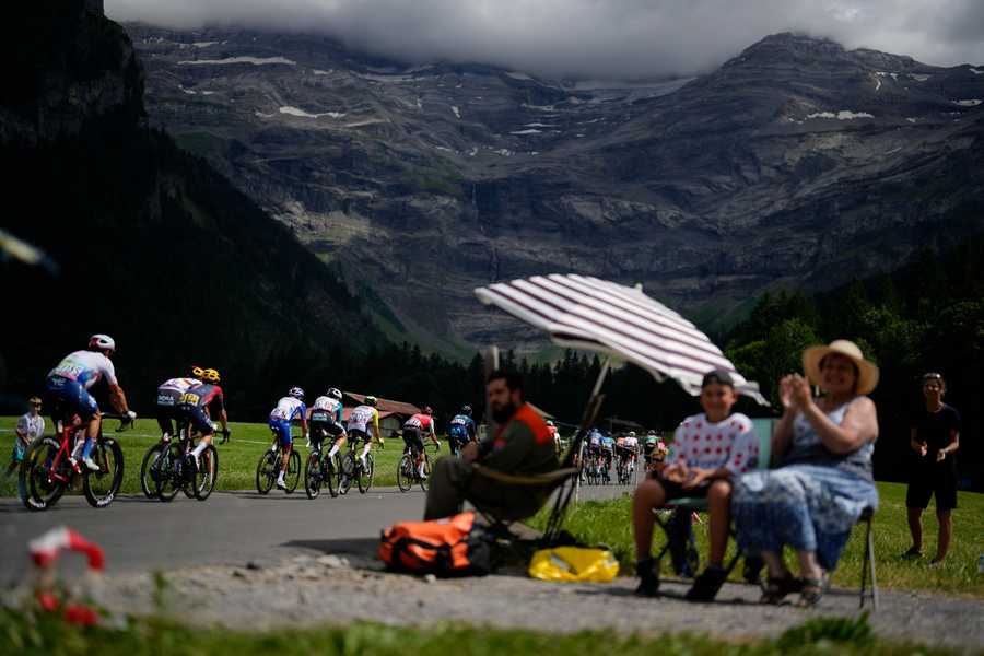 Cycling Tour de France Review Photo Gallery Spectators watch the breakaway group pass during the ninth stage of the Tour de France cycling race over 193 kilometers (119.9 miles) with start in Aigle, Switzerland and finish in Chatel les Portes du Soleil, France, Sunday, July 10, 2022.
