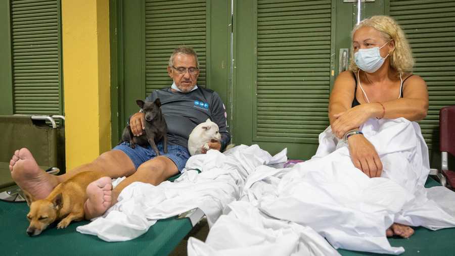 Puerto Rico Tropical Weather Residents affected by Hurricane Fiona rest at a school being used as a storm shelter in Salinas, Puerto Rico, Monday, Sept. 19, 2022.