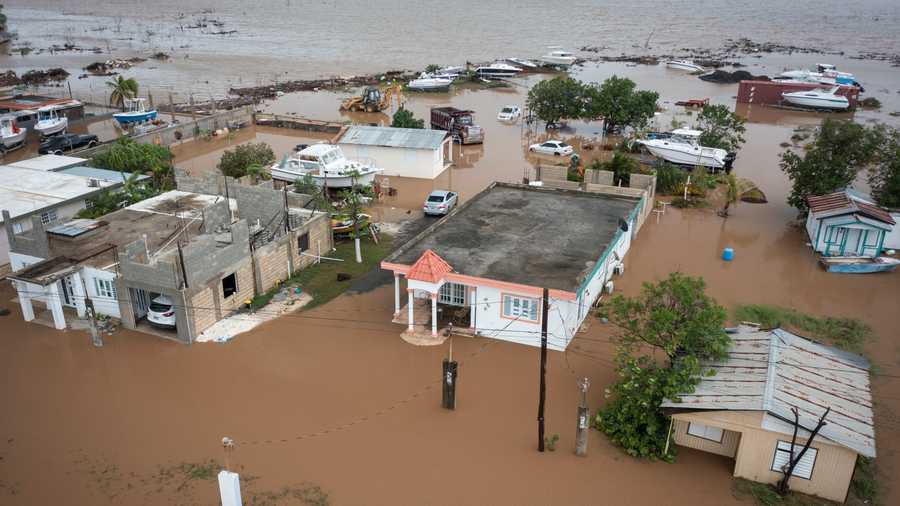 Puerto Rico Tropical Weather Homes are flooded on Salinas Beach after the passing of Hurricane Fiona in Salinas, Puerto Rico, Monday, Sept. 19, 2022.