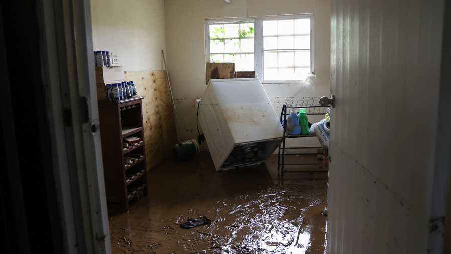 Puerto Rico Tropical Weather Mud covers the floor of a home flooded by Hurricane Fiona in Cayey, Puerto Rico, Tuesday, Sept. 20, 2022. Fiona hit Puerto Rico’s southwest corner on Sunday.