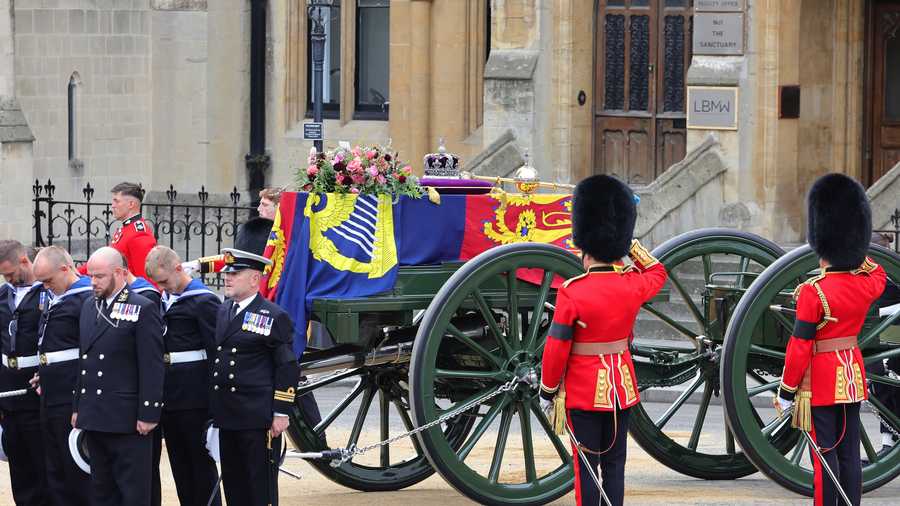 The State Funeral Of Queen Elizabeth II The coffin of Queen Elizabeth II with the Imperial State Crown resting on top, borne on the State Gun Carriage of the Royal Navy proceeds towards Westminster Abbey on Sept. 19, 2022, in London, England.