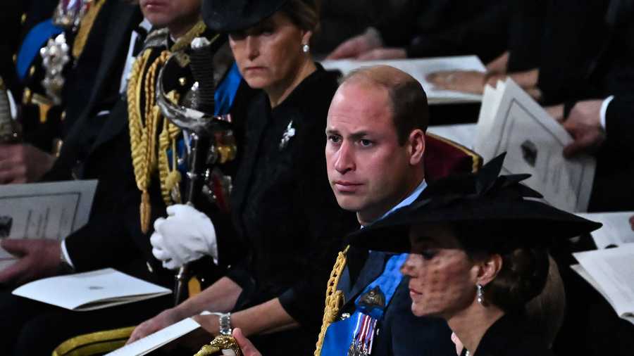 Queen Elizabeth state funeral Prince William, Prince of Wales (C) attends with Catherine, Princess of Wales (R) and Sophie, Countess of Wessex the State Funeral Service for Queen Elizabeth II, at Westminster Abbey in London on Sept. 19, 2022.