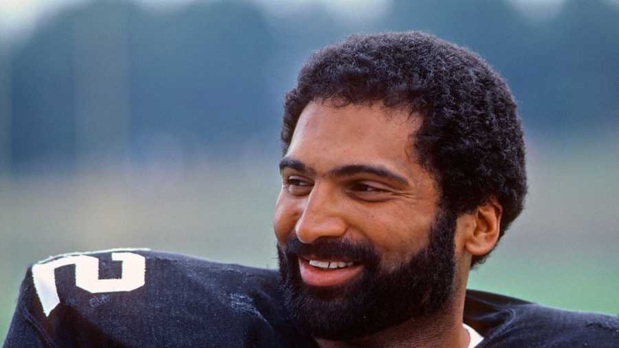 Running back Franco Harris of the Pittsburgh Steelers smiles as he looks on from the field during summer training camp at St. Vincent College in July 1982 in Latrobe, Pennsylvania. Running back Franco Harris of the Pittsburgh Steelers smiles as he looks on from the field during summer training camp at St. Vincent College in July 1982 in Latrobe, Pennsylvania.