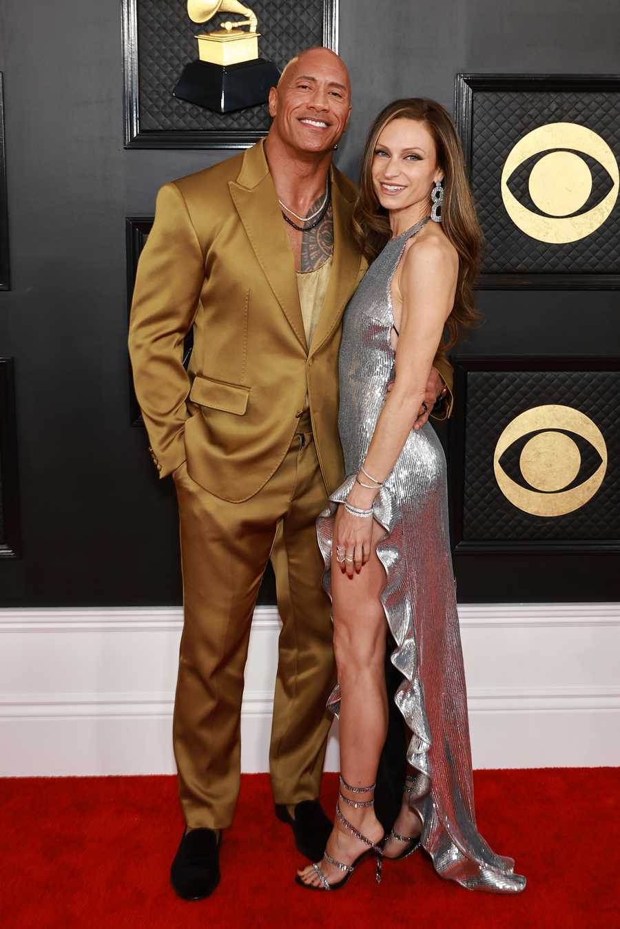 65th GRAMMY Awards - Arrivals los angeles, california february 05 l r dwayne johnson and lauren hashian attend the 65th grammy awards on february 05, 2023 in los angeles, california photo by matt winkelmeyergetty images for the recording academy