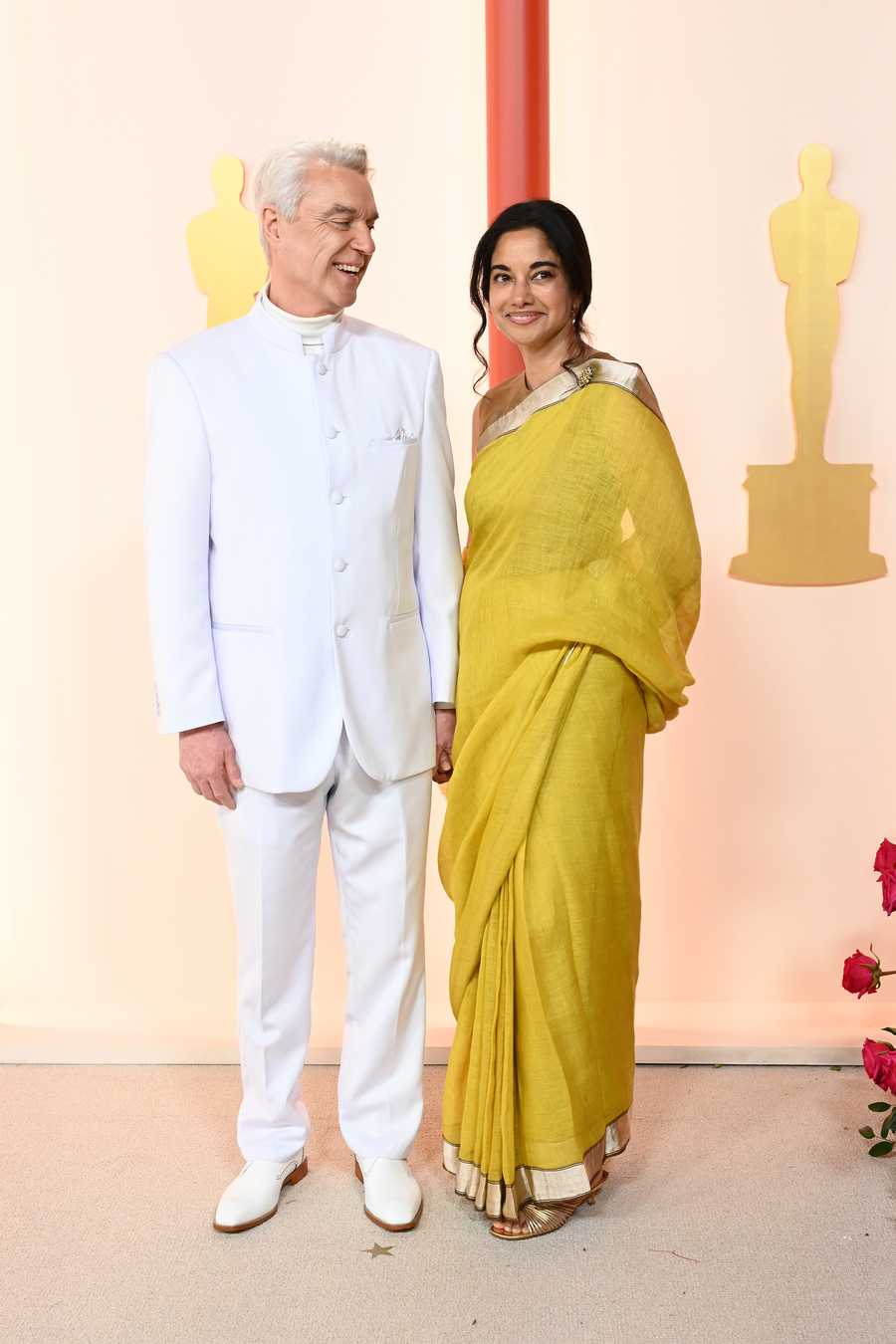 The 95th Annual Academy Awards - Arrivals David Byrne and Mala Gaonkar at the 95th Annual Academy Awards held at Ovation Hollywood on March 12, 2023 in Los Angeles, California. (Photo by Gilbert Flores/Variety via Getty Images)