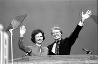 Jimmy and Rosalynn Carter wave to assembled Democratic National Convention after he accepted his party&apos;s nomination for president. (Photo by Shepard Sherbell/Corbis via Getty Images)