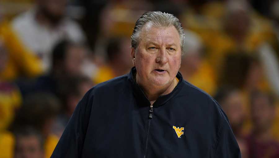 FILE - West Virginia head coach Bob Huggins watches from the bench during the first half of an NCAA college basketball game against Iowa State, Monday, Feb. 27, 2023.